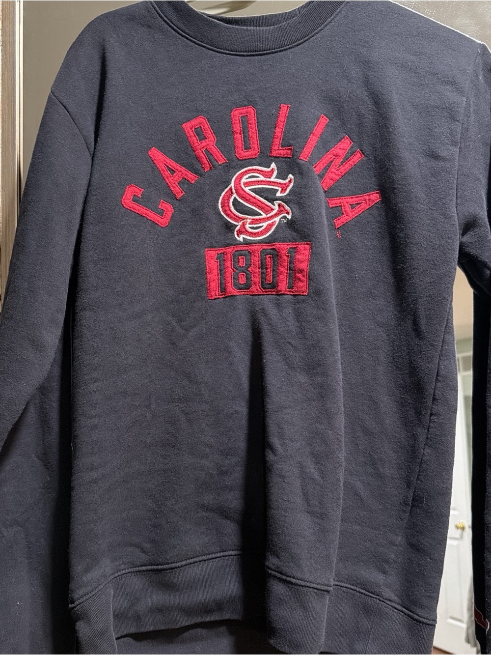 League Navy Crewneck Sweatshirt with Red Appliqué